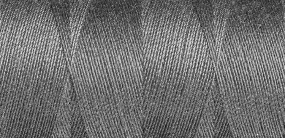 Gray sewing thread texture Stock Photos