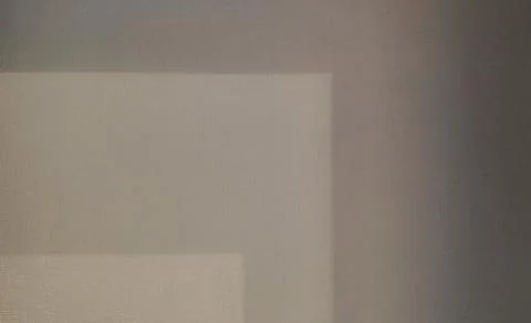 Gray shadows on the wall in the room Stock Photos