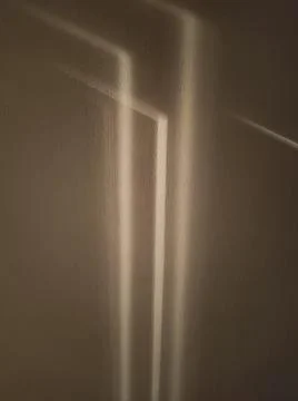 Gray shadows on the wall in the room Stock Photos