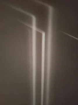 Gray shadows on the wall in the room Stock Photos