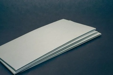 Gray, silver envelope on a black flat background, luxury corporate identity a Stock Photos