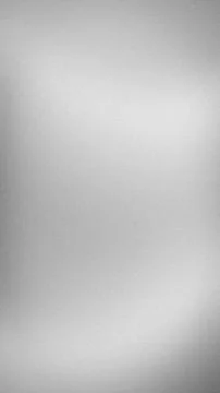 Gray silver grainy vertical background with blur abstract gradient and grun.. Stock Photos