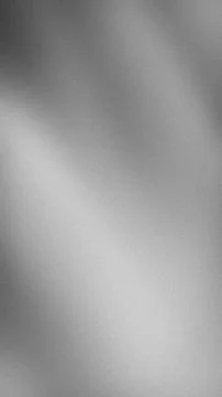 Gray silver white grainy abstract vertical background texture gradient blur.. Stock Photos