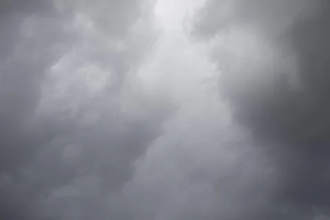 Gray sky. Cold weather. Clouds covered the sky. Weather changes. Stock Photos