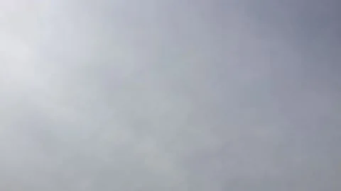 The gray sky is covered with solid gray clouds. Stock Footage 170432521