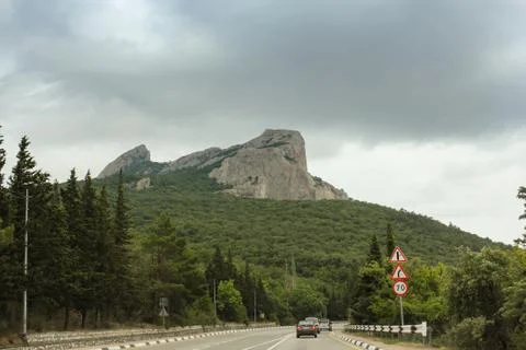 Gray sky over the cliff. Stock Photos