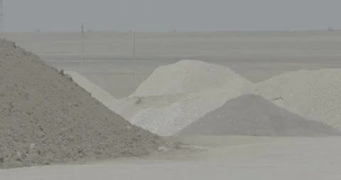 Gray sky, piles, two mountains of rock mixture Stock Footage 305641883