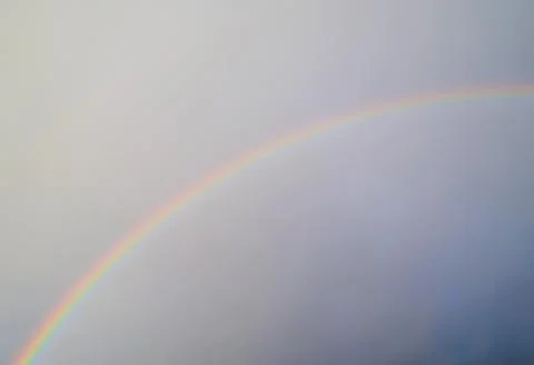 Gray sky with rainbow Stock Photos