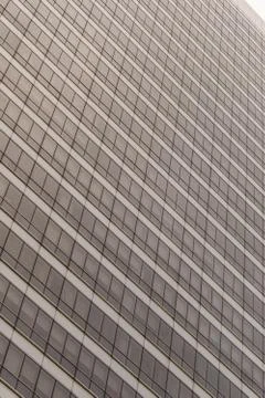 Gray skyscraper facade Stock Photos