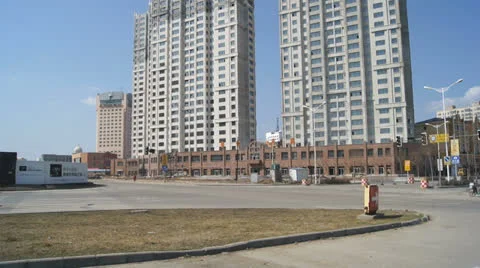 Gray skyscrapers under construction (pan up) Stock Footage 22975888