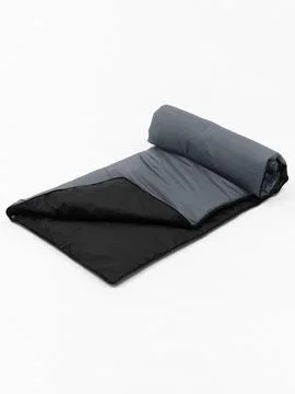 Gray sleeping bag folded flat Stock Photos