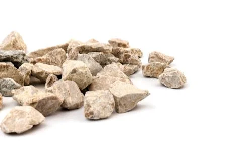 Gray small rocks ground texture isolated on white background. Small road ston Stock-Fotos