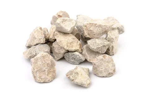 Gray small rocks ground texture isolated on white background. Small road ston Stock-Fotos