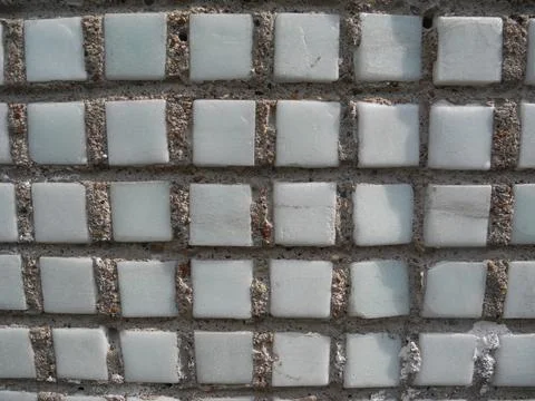 Gray small rocks ground texture. Gravel pebbles stone seamless texture. Backg Stock Photos