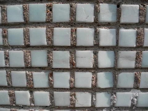 Gray small rocks ground texture. Gravel pebbles stone seamless texture. Backg Stock Photos