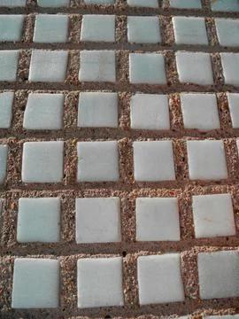 Gray small rocks ground texture. Gravel pebbles stone seamless texture. Backg Stock Photos