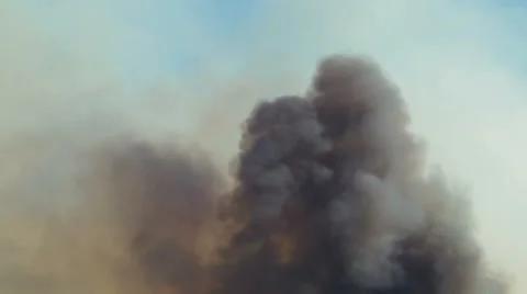 Gray smoke billowing through sky Stock-Footage 54642498