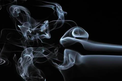 Gray smoke on black background Stock Photos