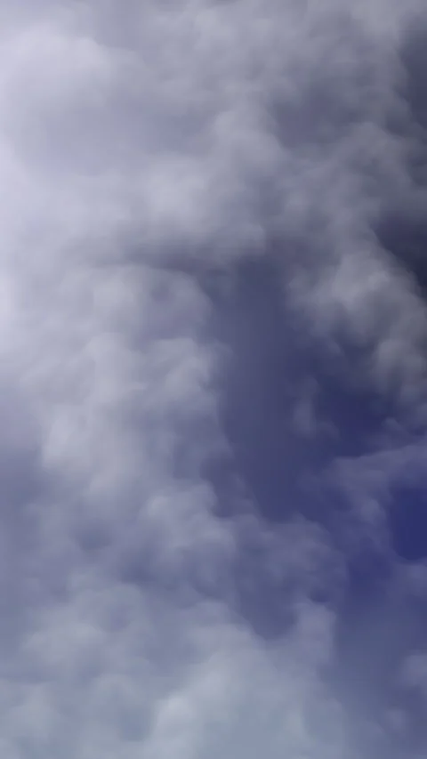 Gray Smoke Clouds Swirling Slowly in Moody Blue Atmospheric Background Video stock 333981709