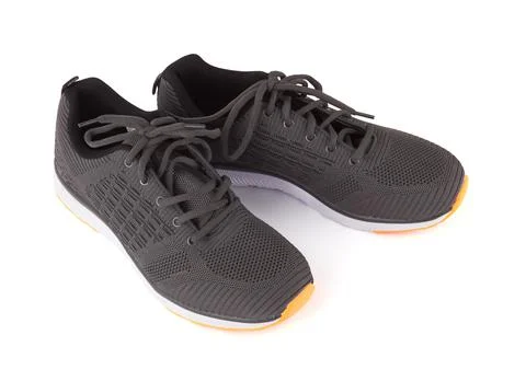 Gray sneakers isolated Stock-Fotos