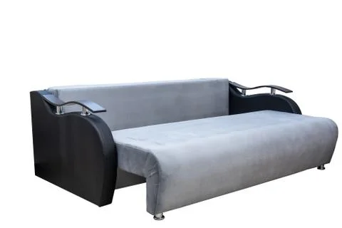Gray sofa with black armrests folded and laid out as a bed isolated on a whit Stock Photos