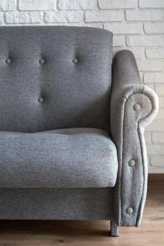 Gray sofa in the room. Modern interior. Stock Photos