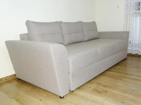 Gray sofa in a room Photos