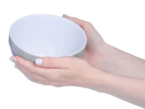 Gray soup plate in hand Stock Photos