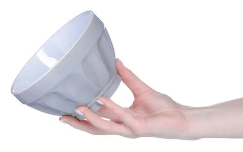 Gray soup plate in hand Stock Photos