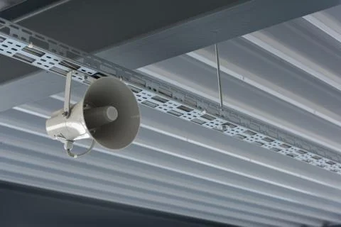A gray speaker depends on the modern ceiling Stock Photos