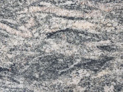 Gray speckled granite Stock Photos