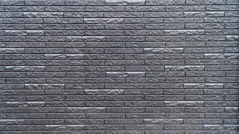 Gray Split Stone Wall Cladding with Stacked Brick Texture Stock Photos