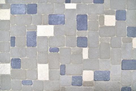 Gray stone background, background tiles from rectangular stones Stock Photos