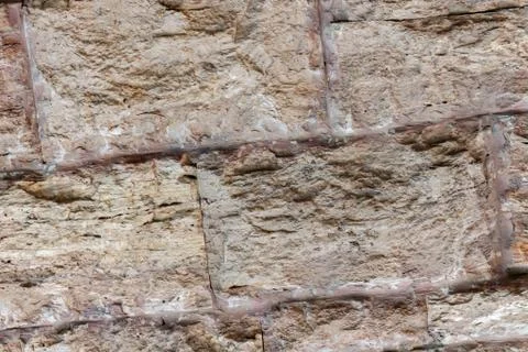 Gray stone background foundation rigid wall block cement strips basis Stock Photos