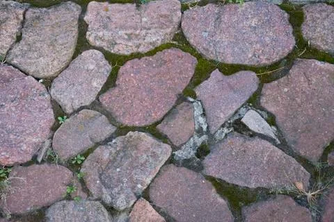 Gray stone background paths in the garden. Natural texture. Stock Photos