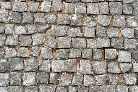 Gray stone background, stone paving slabs, paving stone pattern Stock Photos