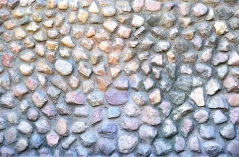 Gray stone background of stones of different shapes and structures connected  Stock Photos