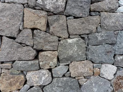 Gray stone block wall texture Stock Photos