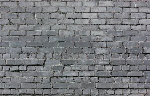 Gray stone bricks wall pattern texture background horisontal rows structure Foto stock