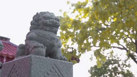 A gray stone carving lion set on a platform of a temple in Taiwan. Stock Footage 140259538
