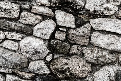 Gray stone cobblestone background toned texture base Stock Photos