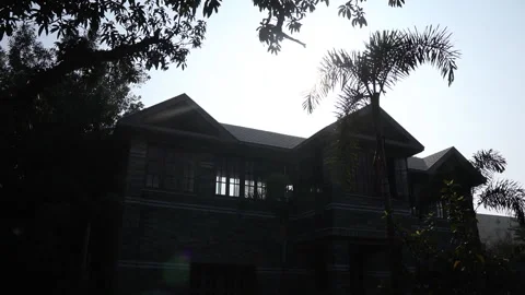 Gray Stone House with Sun Flare 動画素材 336341057
