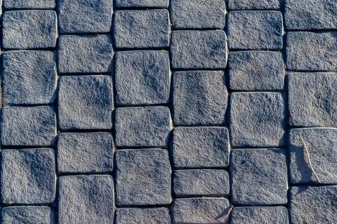 Gray stone paved surface, vertical direction with side light Stock Photos