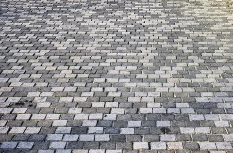 Gray stone paving slabs. Stock Photos