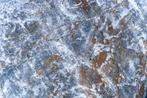 Gray stone surface with brown and white pattern. Stock Photos
