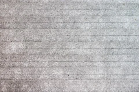 Gray stone texture with horizontal lines and subtle speckles Фото