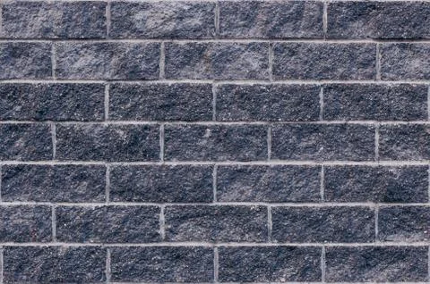 Gray stone tile on the wall Fotos de archivo