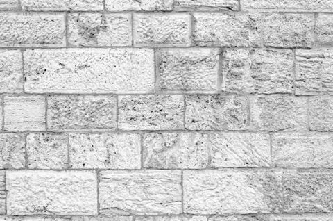 Gray stone wall as an abstract background Stock Photos