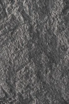 Gray stone wall. Abstract vertical pattern. Stone texture. Stock Photos