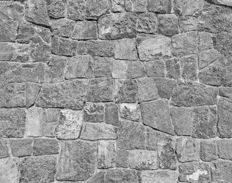 Gray stone wall background with copy space in monochrome tone. Foto stock